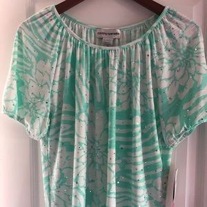 Cathy Daniel’s mint green top